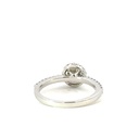 Diamond ring with halo of diamonds and diamond band