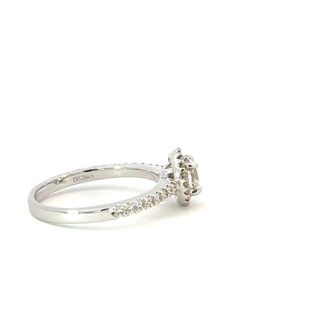 Diamond ring with halo of diamonds and diamond band