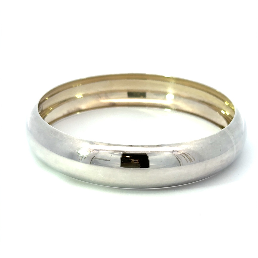 Wide hollowed out bangle in silver