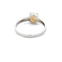 Sterling silver ring with an oval white opal