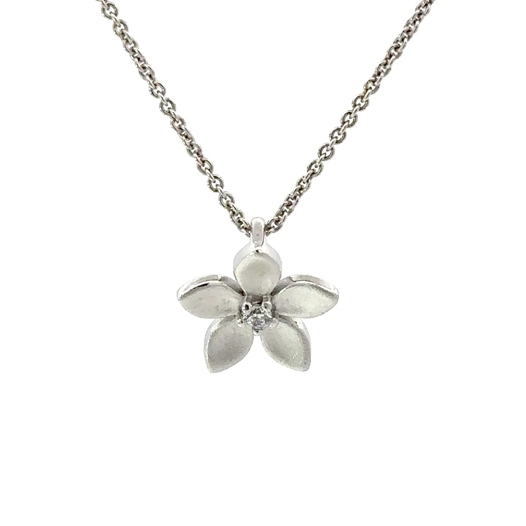Matte flower in sterling silver on a fine necklace