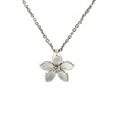 Matte flower in sterling silver on a fine necklace