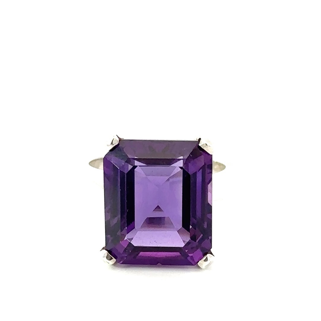 Sterling silver ring with a rich amethyst centre.