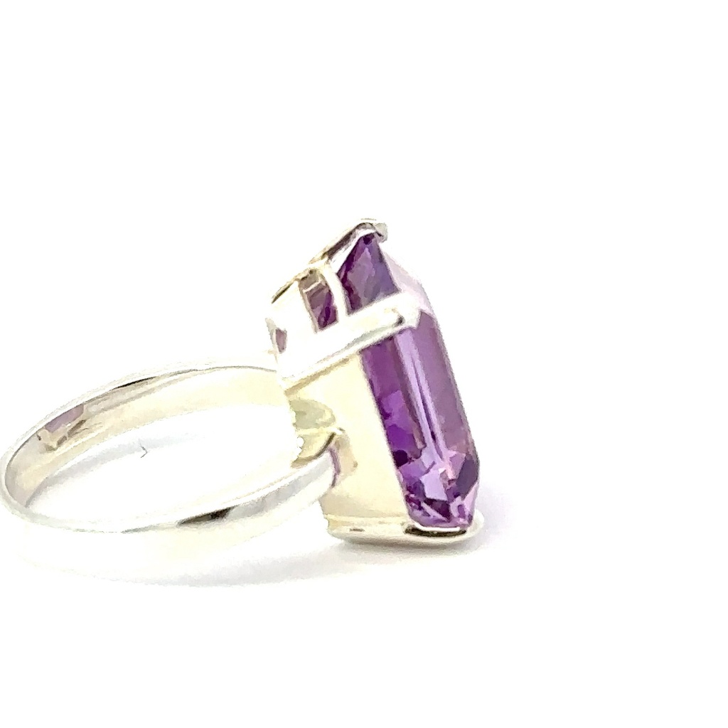 Sterling ring with a bold pastel emerald cut amethyst