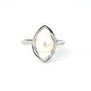 Freshwater pearl ring sitting in a marquise frame
