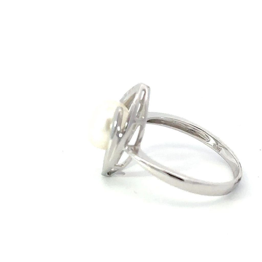 Freshwater pearl ring sitting in a marquise frame