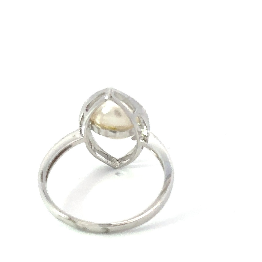 Freshwater pearl ring sitting in a marquise frame