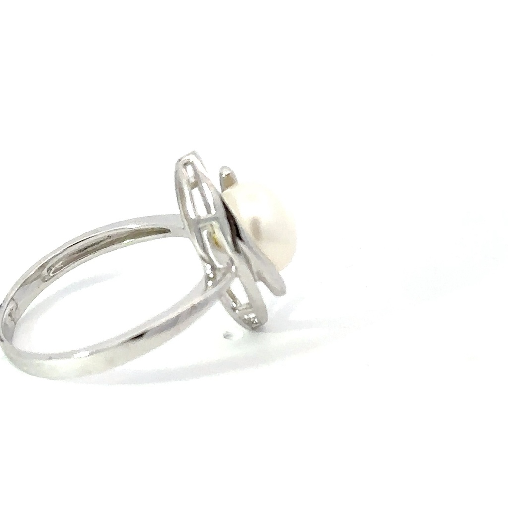Freshwater pearl ring sitting in a marquise frame