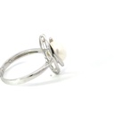 Freshwater pearl ring sitting in a marquise frame