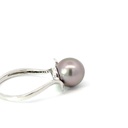 Sterling silver ring with a Tahitian pearl & diamond band that twists up to the setting