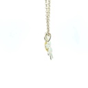 Sterling silver daisy pendant with gold plated centre