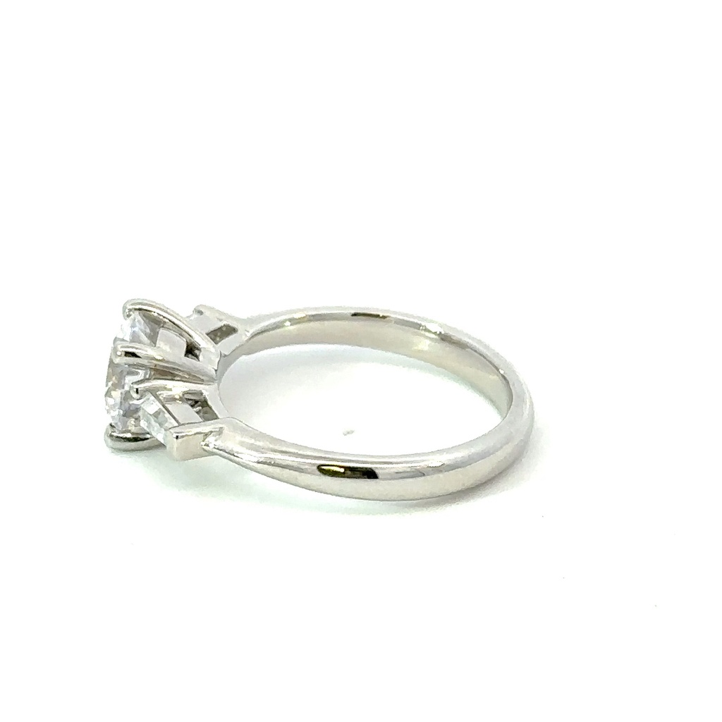 Cubic zirconia with tapered baguettes either side ring, in silver