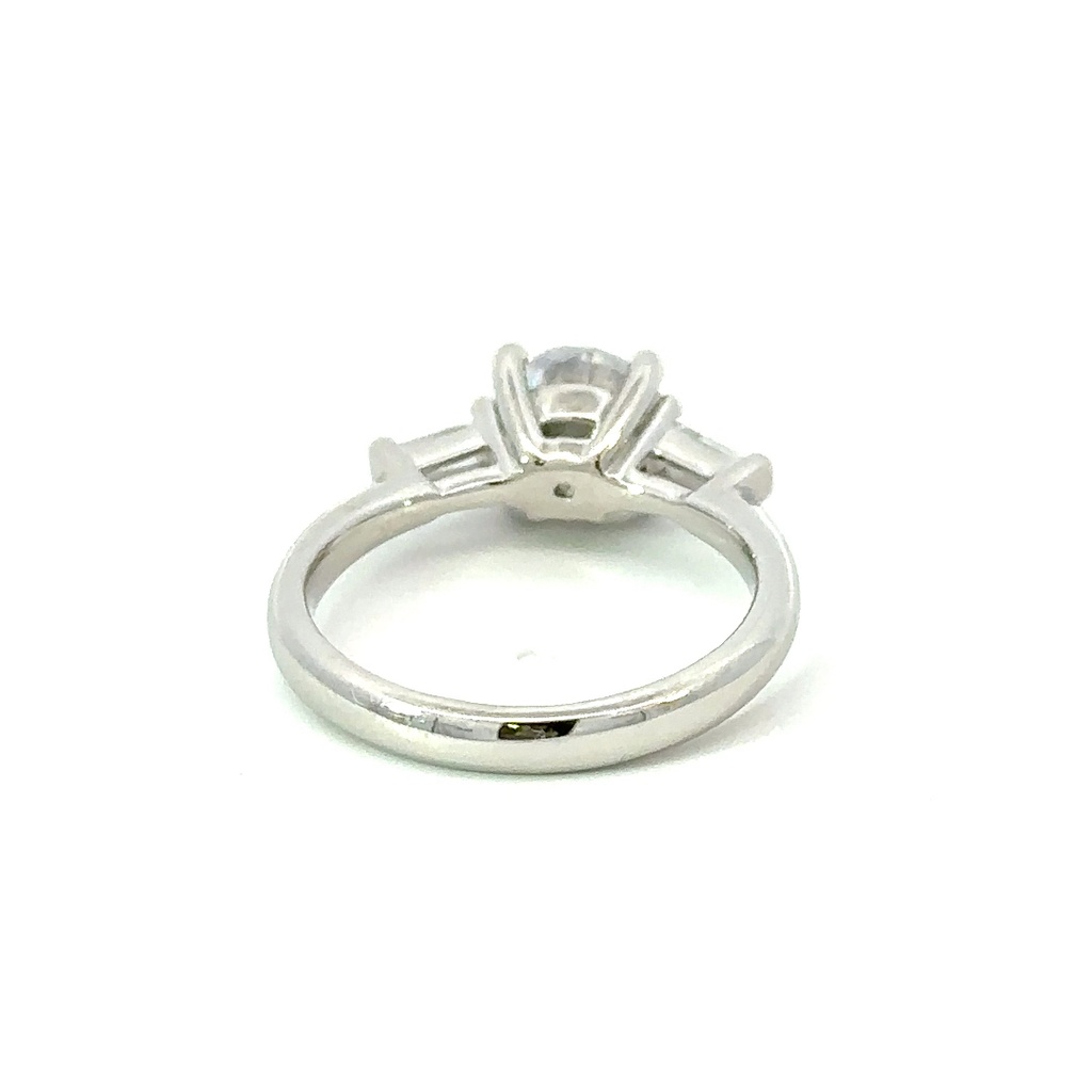 Cubic zirconia with tapered baguettes either side ring, in silver