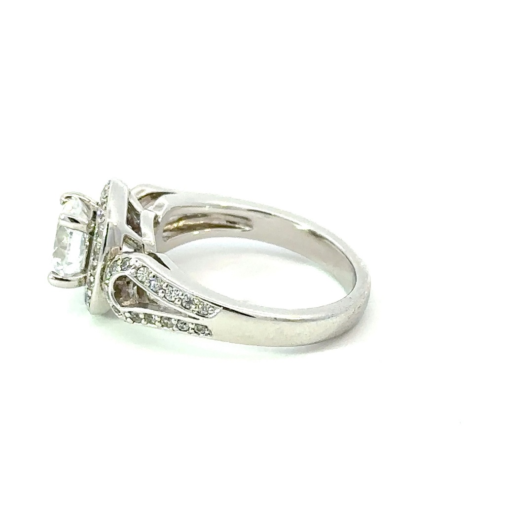 Cubic zirconia set ring in sterling silver with cz halo and band