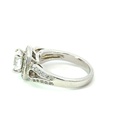 Cubic zirconia set ring in sterling silver with cz halo and band