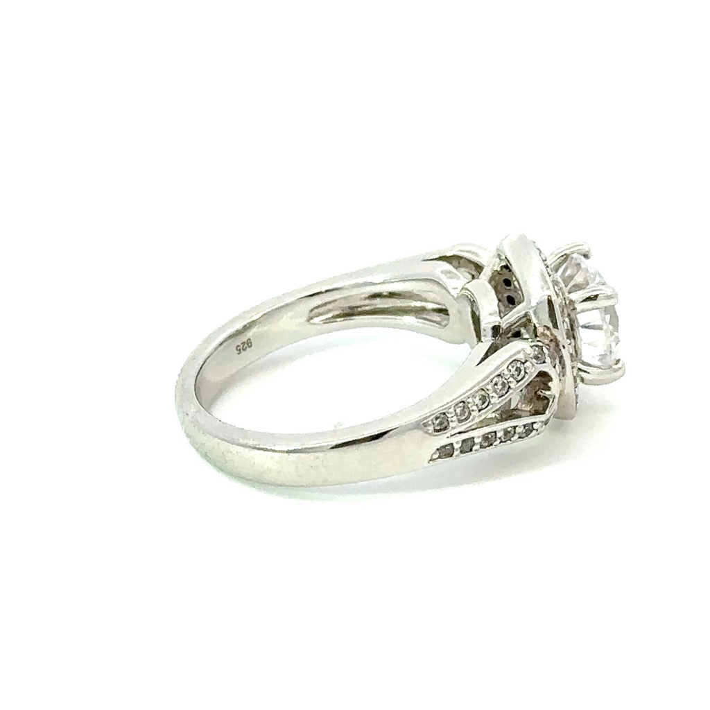 Cubic zirconia set ring in sterling silver with cz halo and band