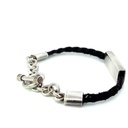 Silver bar on black cord bracelet