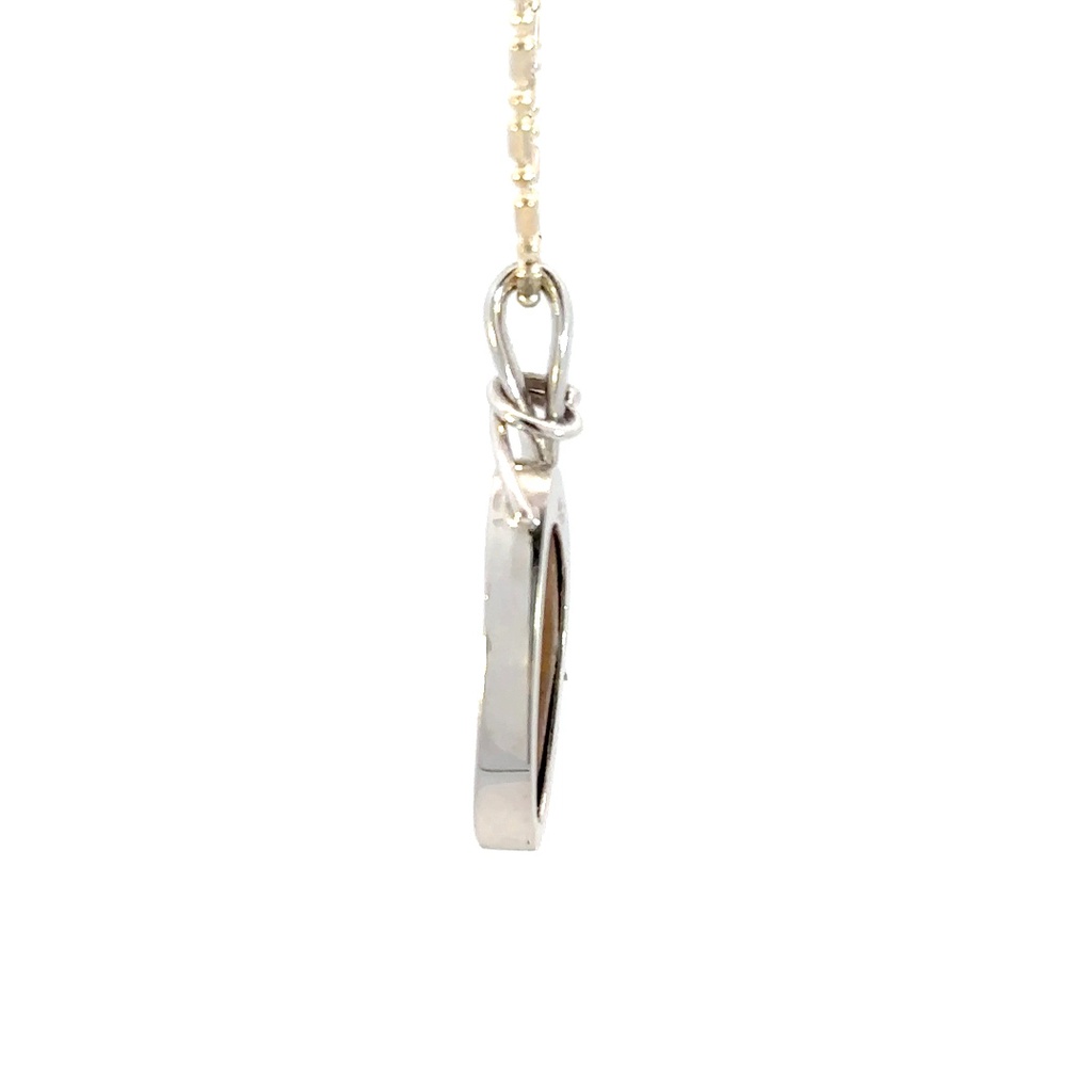 Solid boulder opal pendant in sterling silver