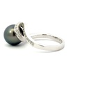 Tahitian pearl with a wavy diamond set band in 18K