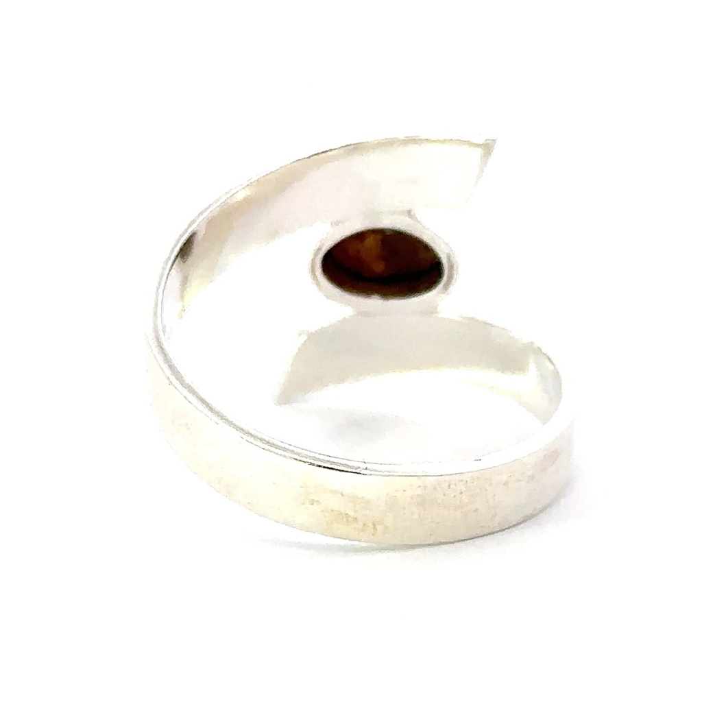 Swirling sterling silver ring with an opal set centre