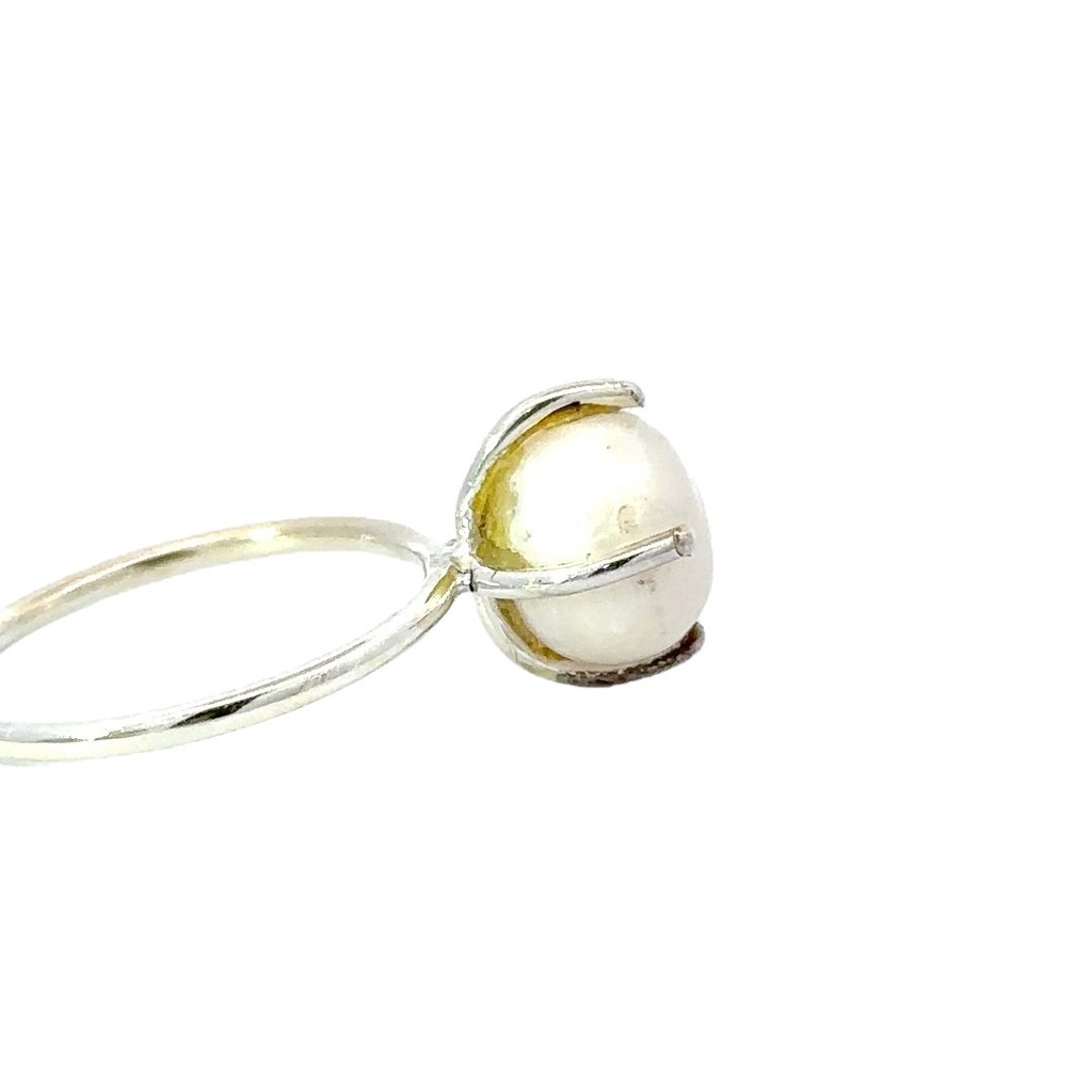 Freshwater pearl ring in a four claw sterling silver setting