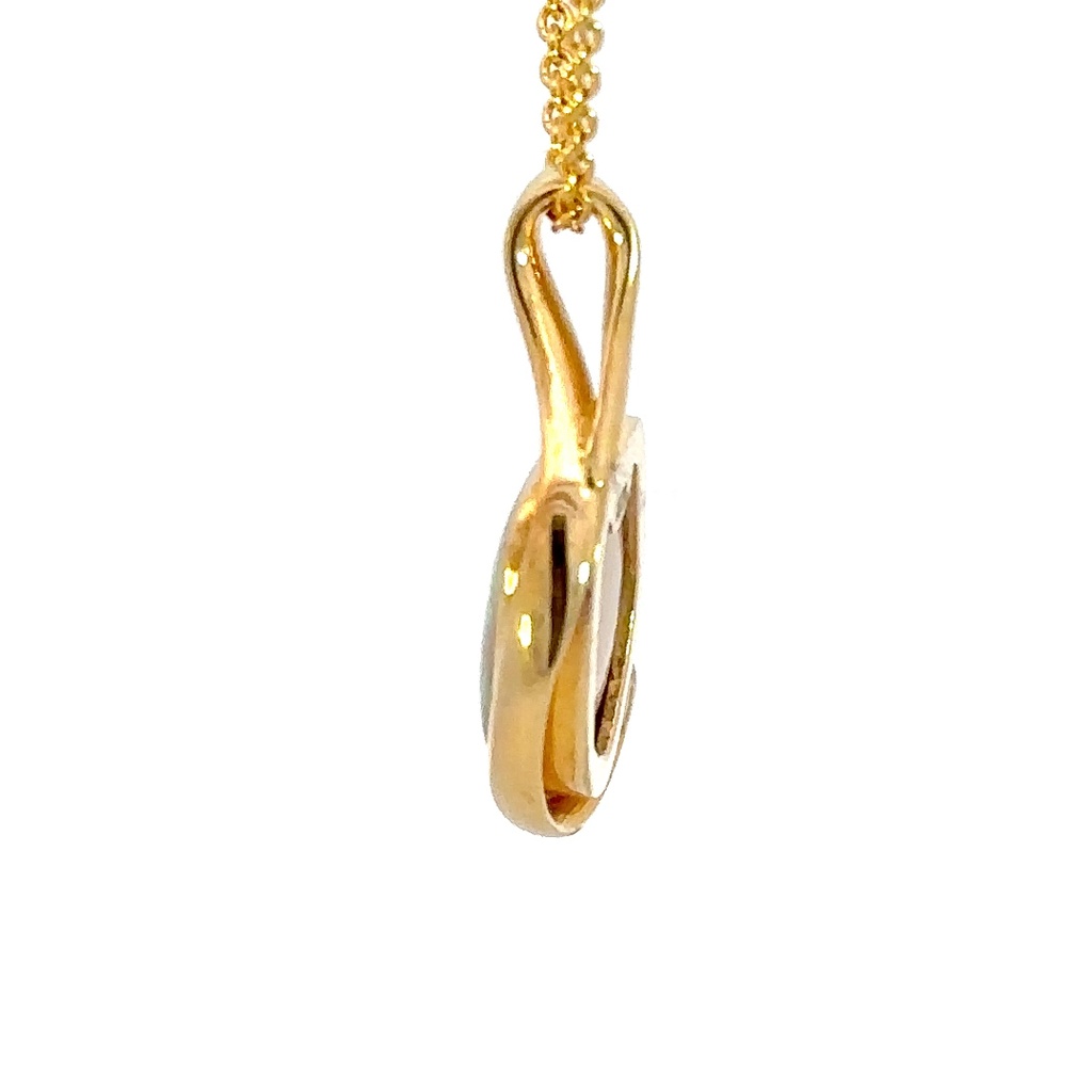 Solid crystal Australian opal pendant set in 18K yellow gold