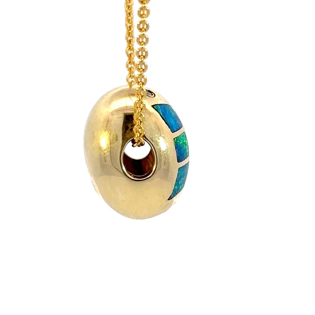 Unique pod shaped pendant in 14K with inlaid opal