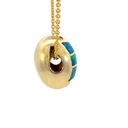 Unique pod shaped pendant in 14K with inlaid opal