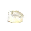 Wide sterling silver ring set with a pear shaped opal