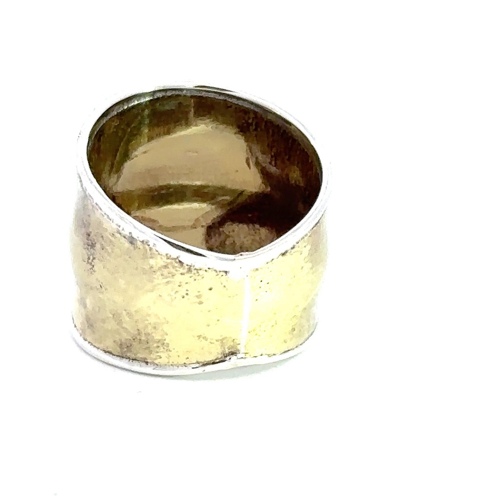 Two tone wide ring in silver and brass graduating down to the back