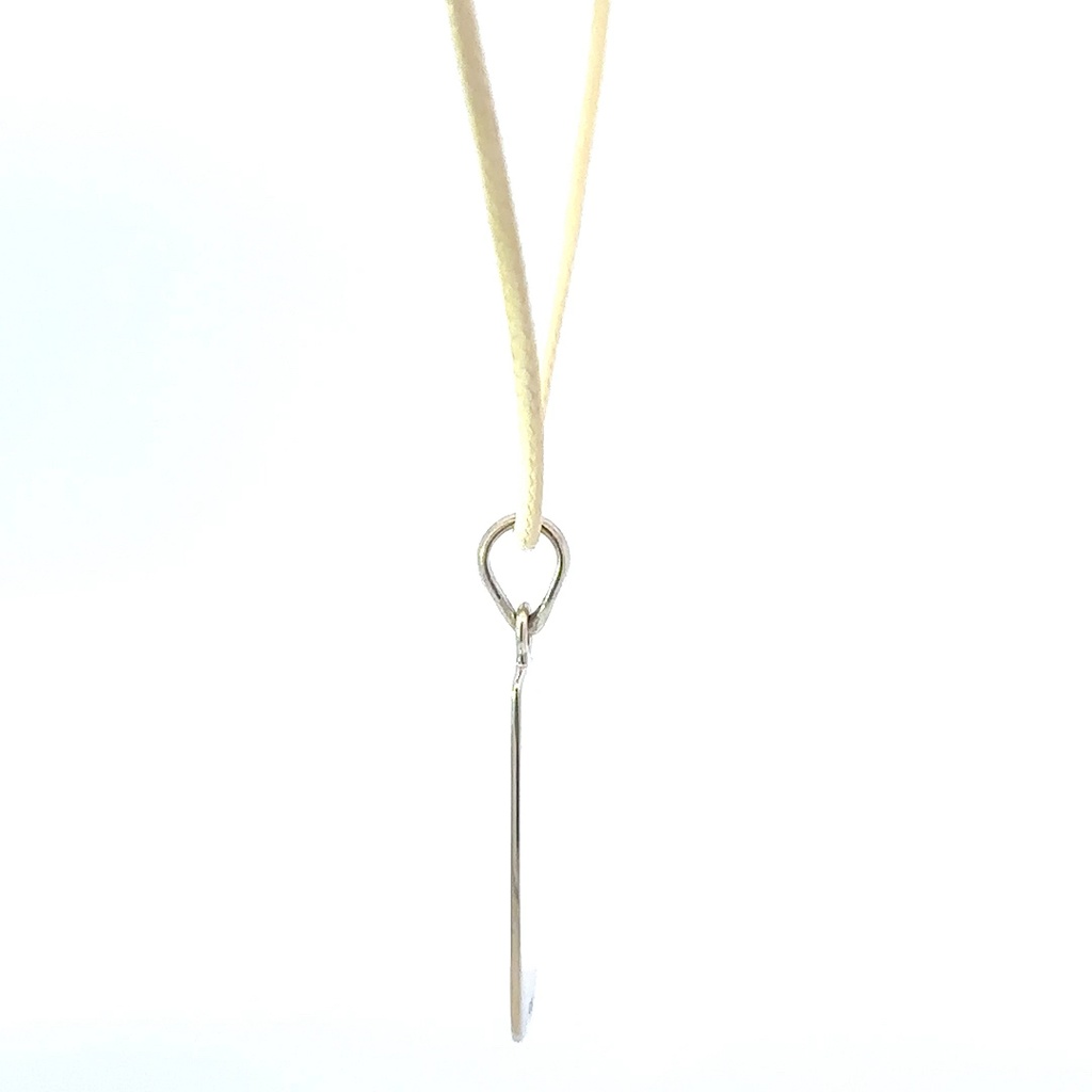 Pendant Tag With "Possibility" Engraved On It On Cream Cord