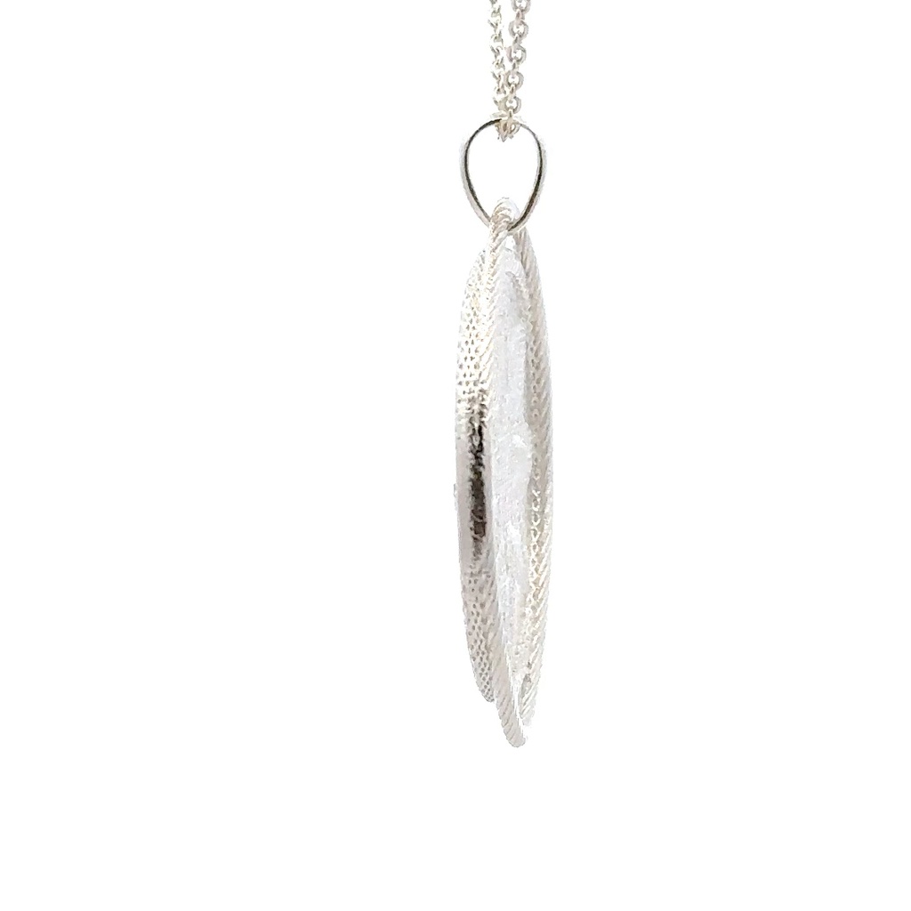 New Guinea Threads: A Silver Woven Pendant