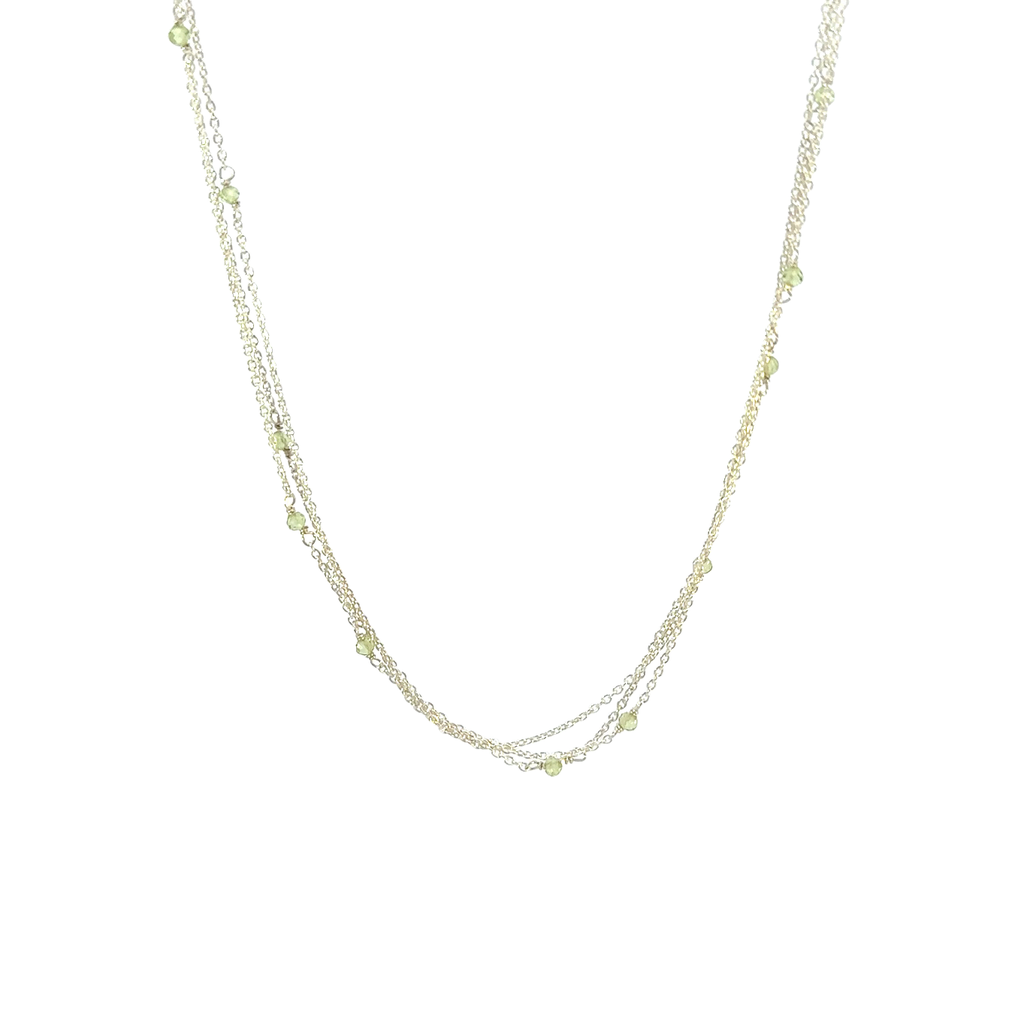 Necklace With Spaced Peridot Beads In Silver