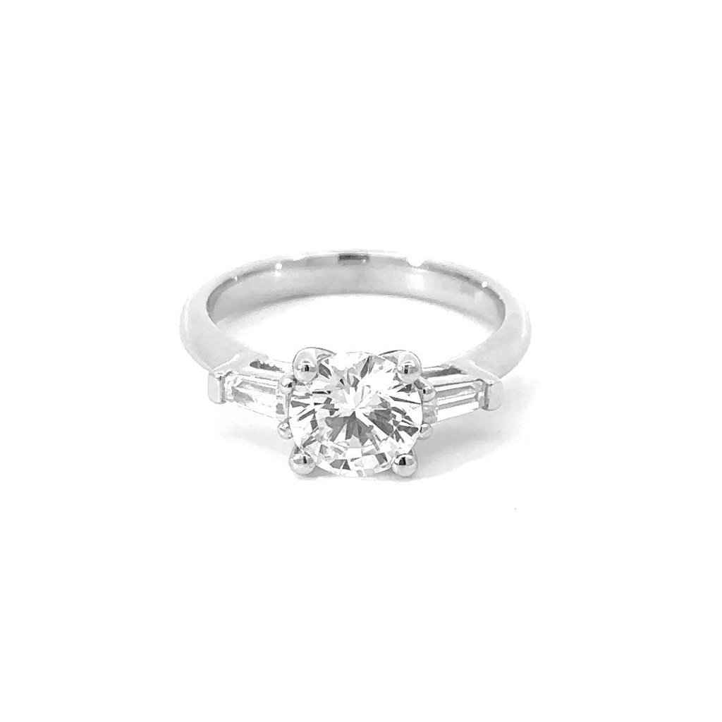 Cubic Zirconia Ring With Tapered Baguettes In Silver