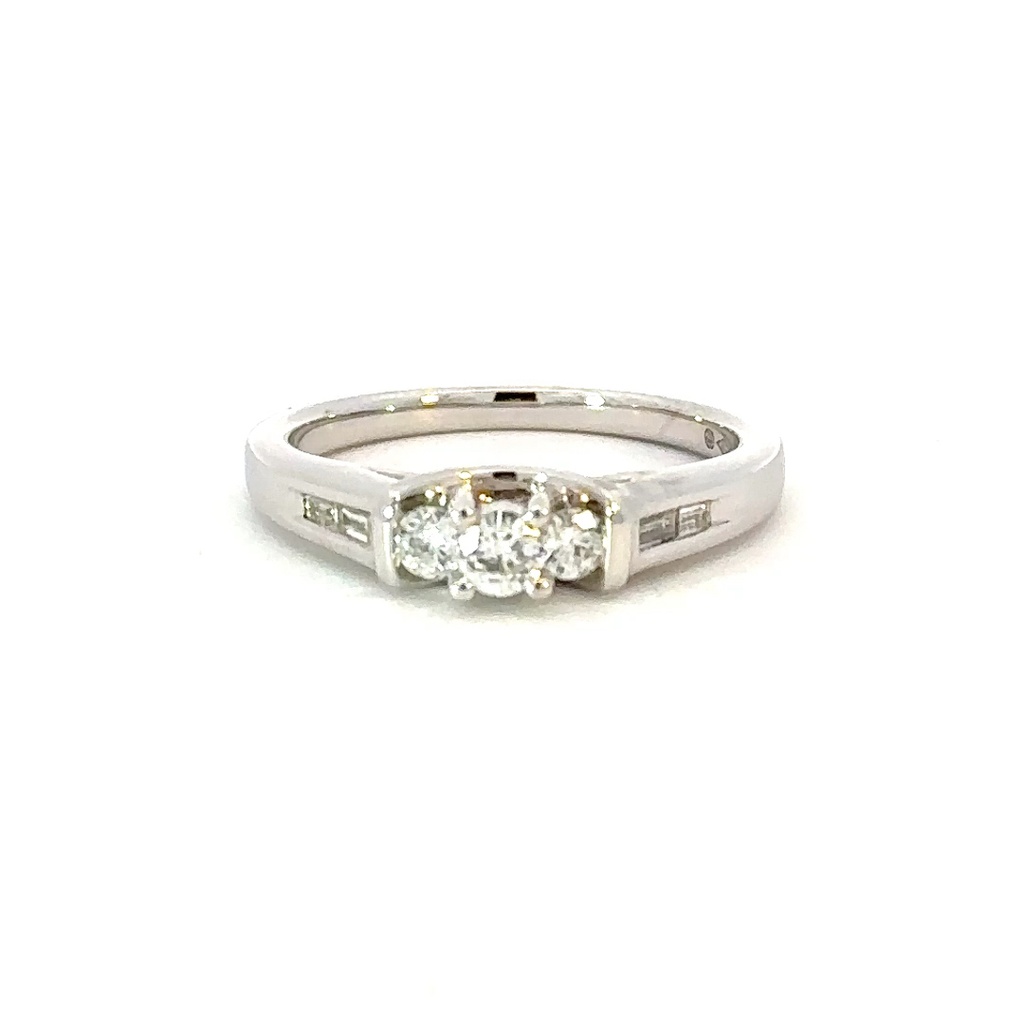 Round Brilliant & Baguette Cut Diamond Ring In 18K