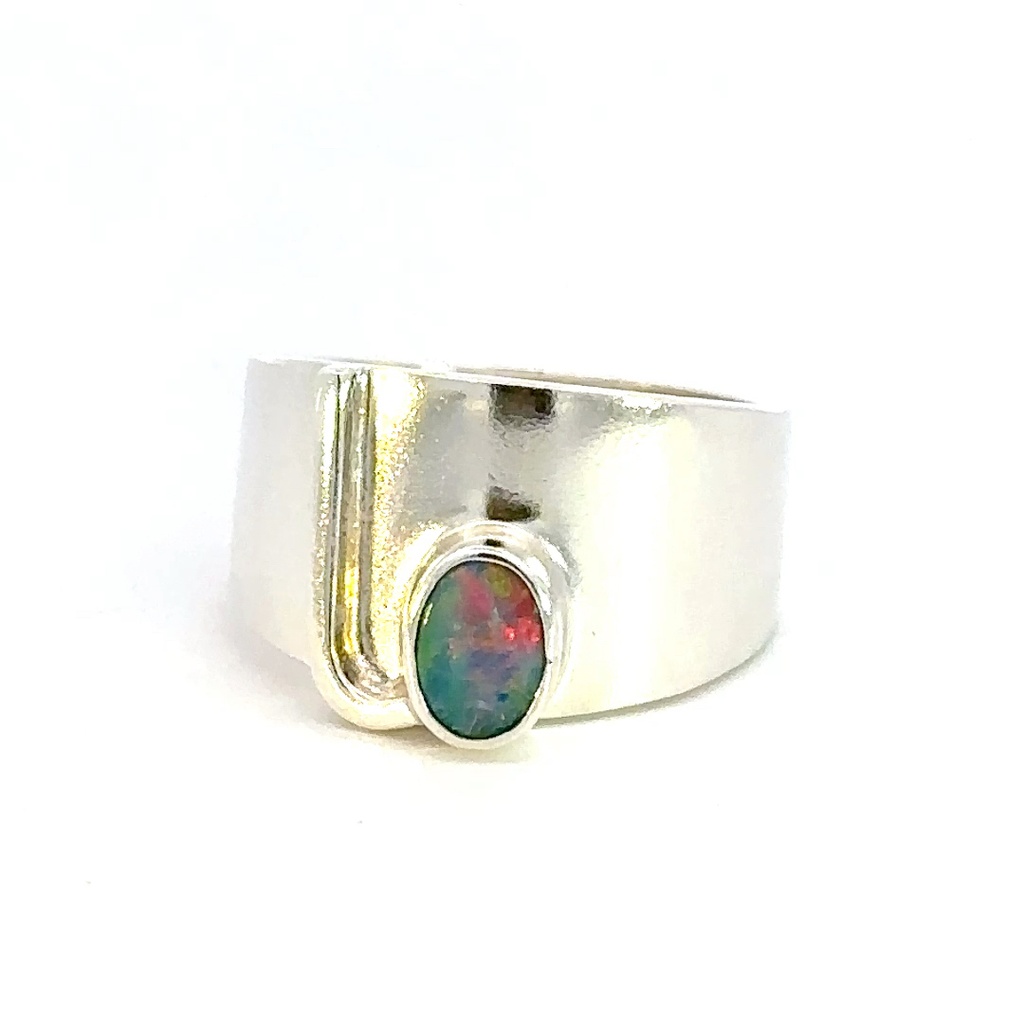 A Vibrant Australian Opal In A Wide Sterling Silver Ring