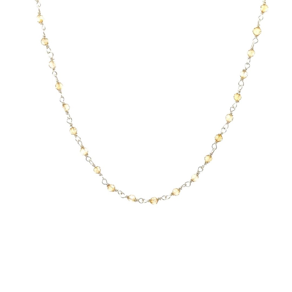 Citrine Beads Spaced On A Sterling Silver Necklace